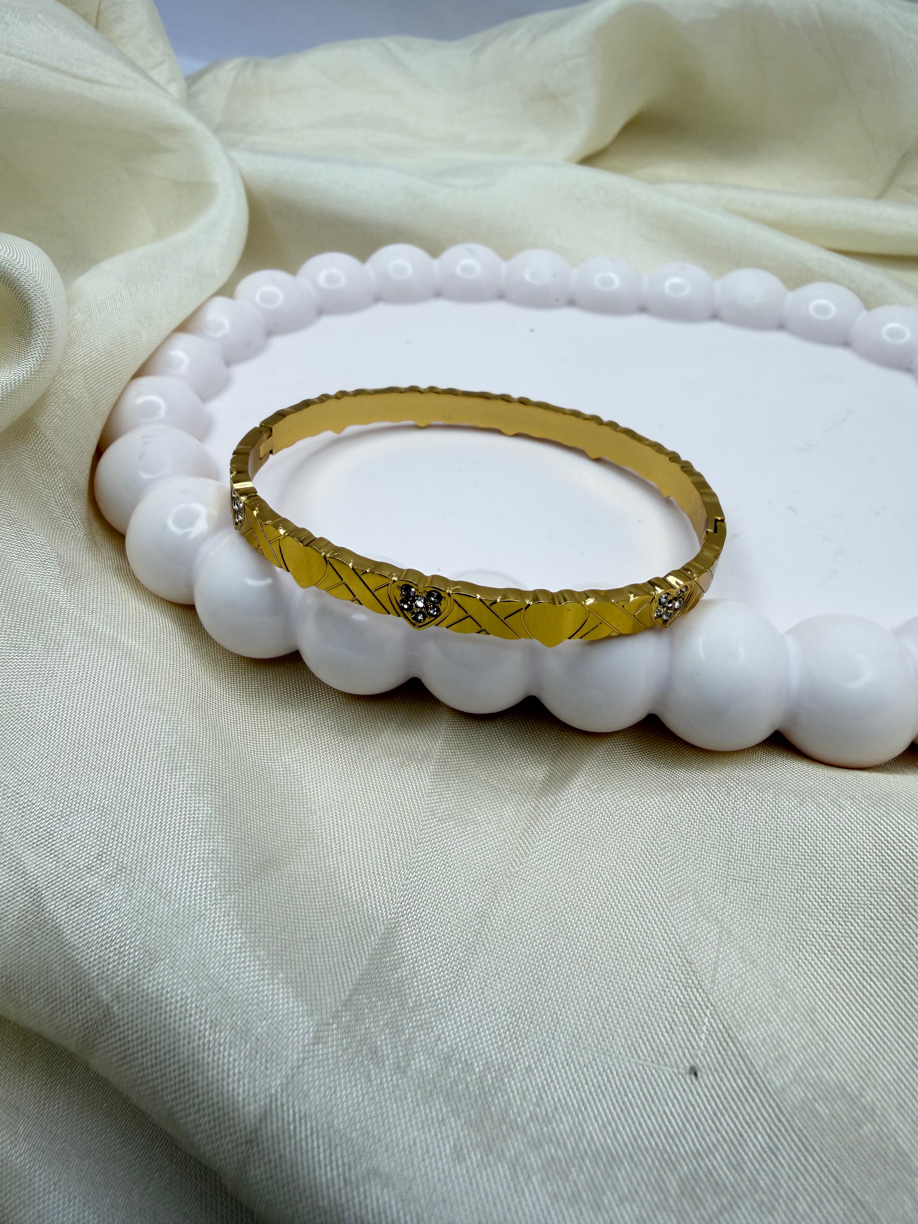 Rhythmic Heart Bangle Bracelet