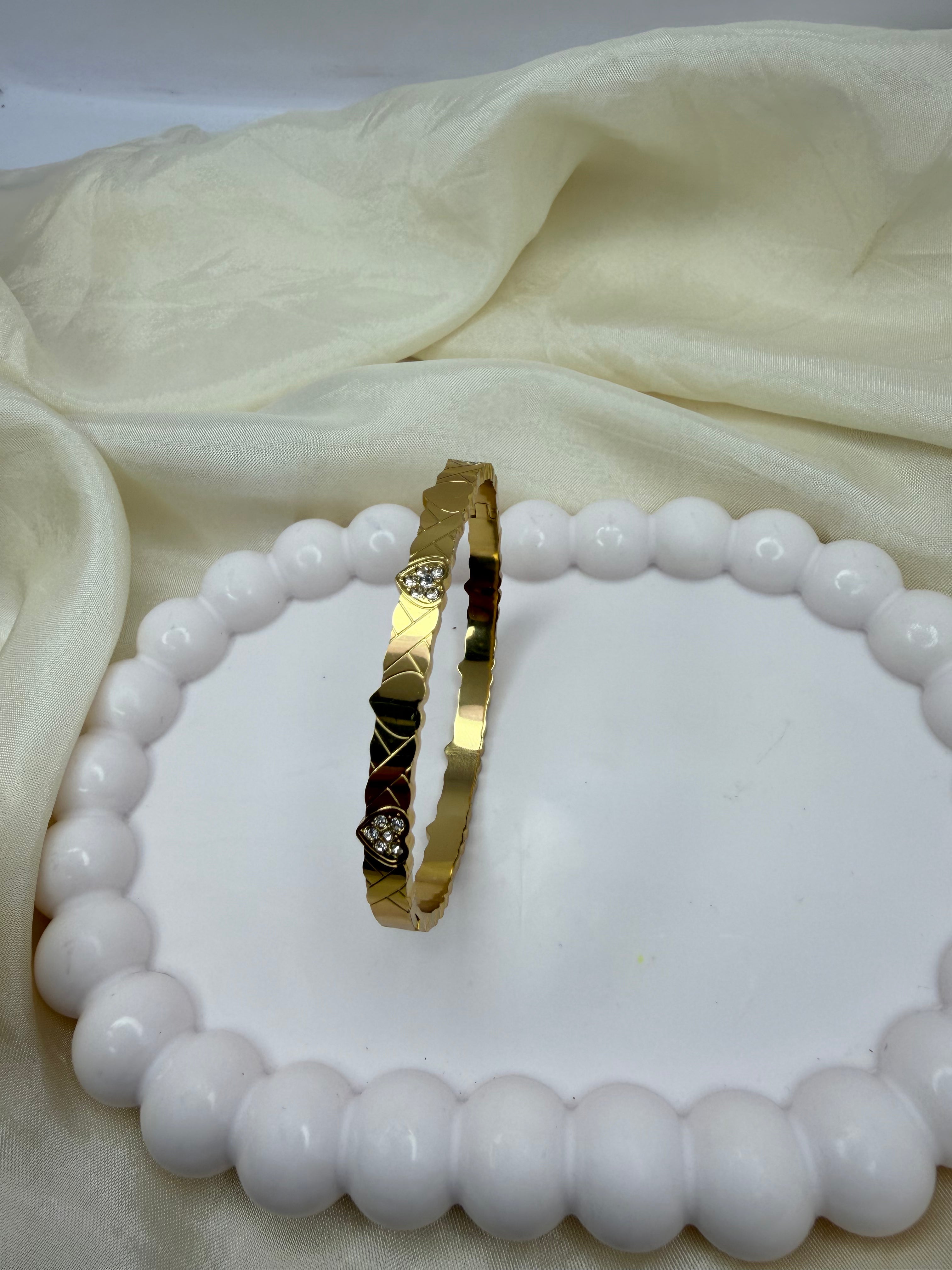 Rhythmic Heart Bangle Bracelet