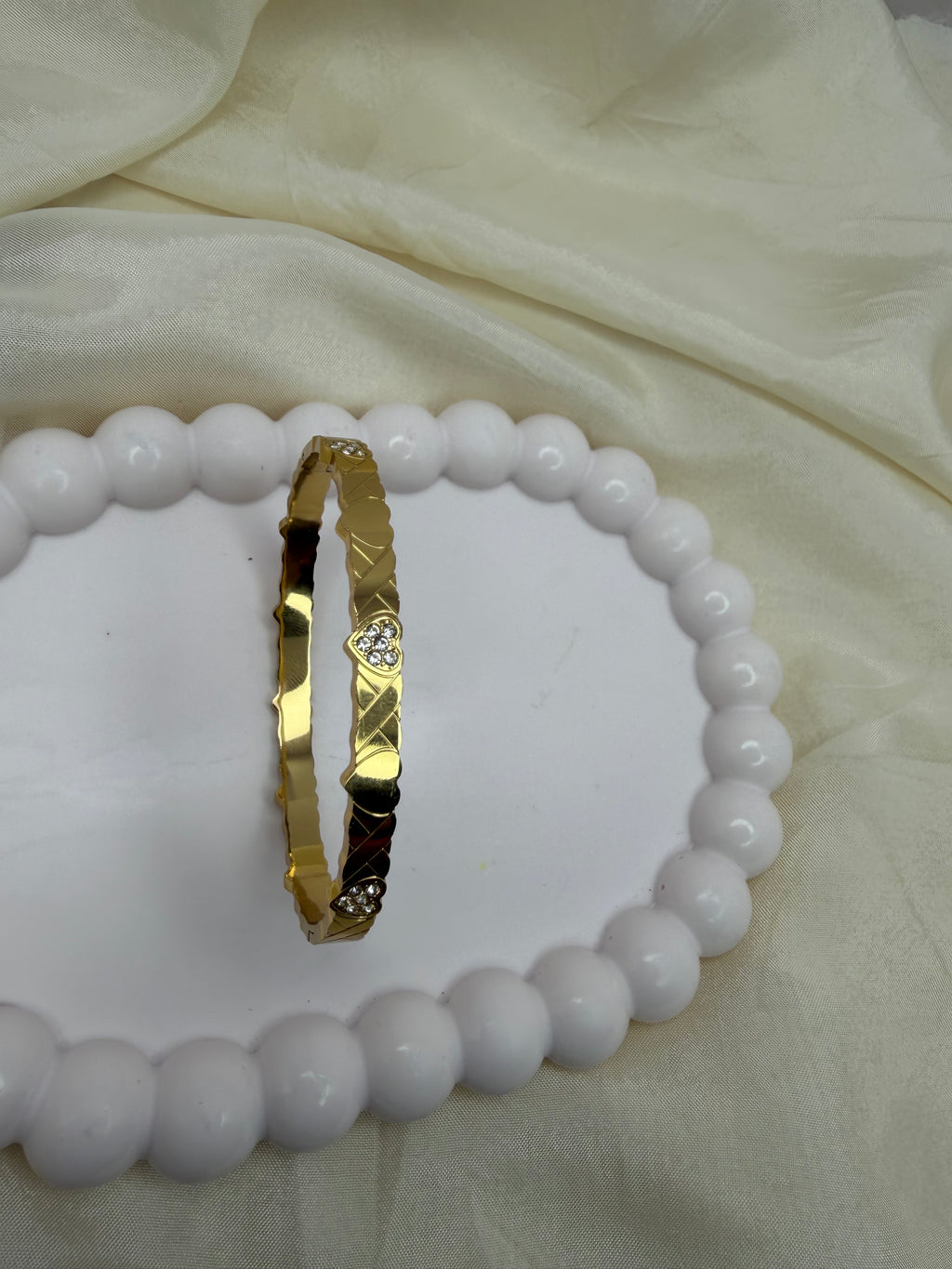 Rhythmic Heart Bangle Bracelet