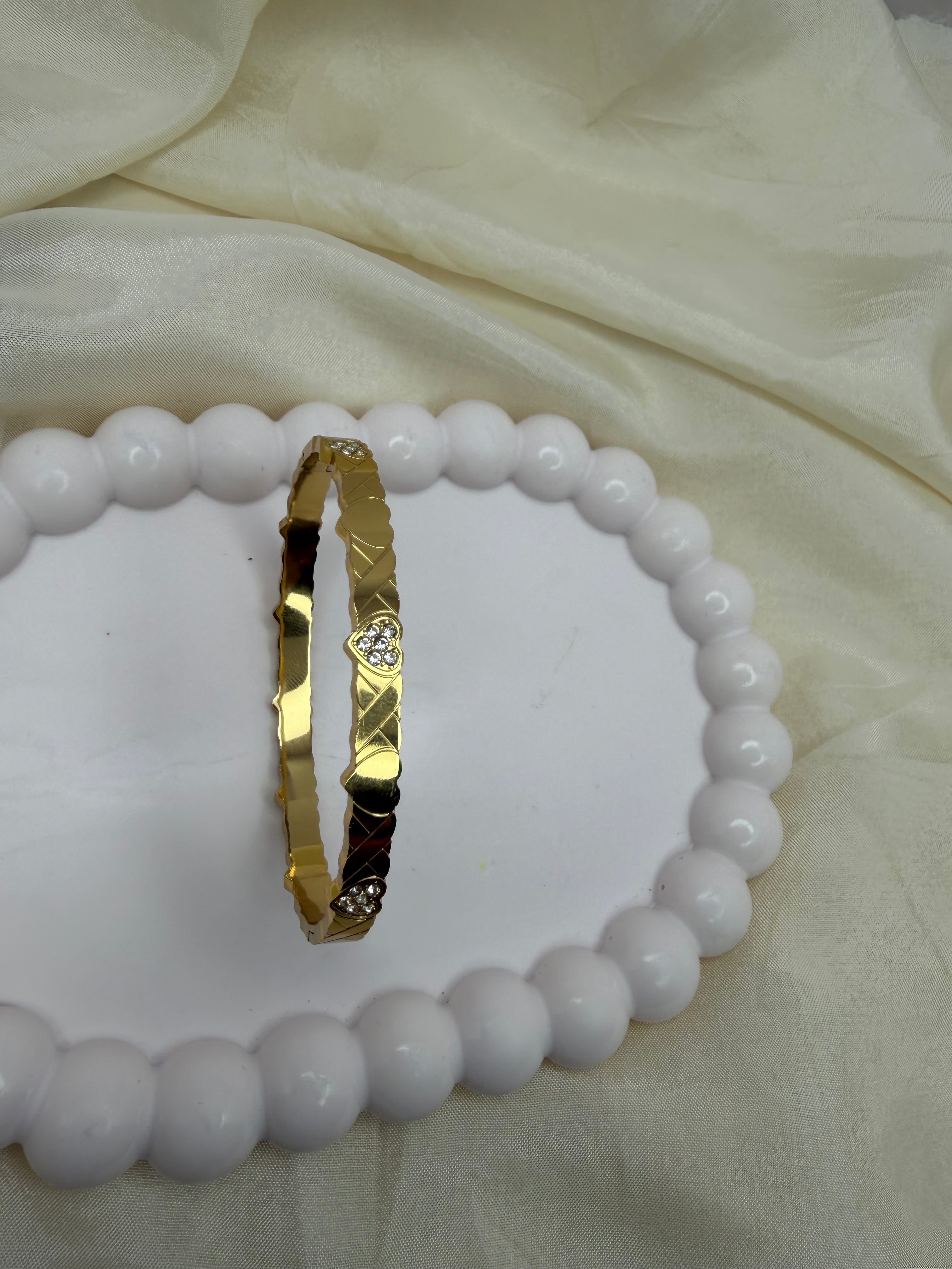 Rhythmic Heart Bangle Bracelet