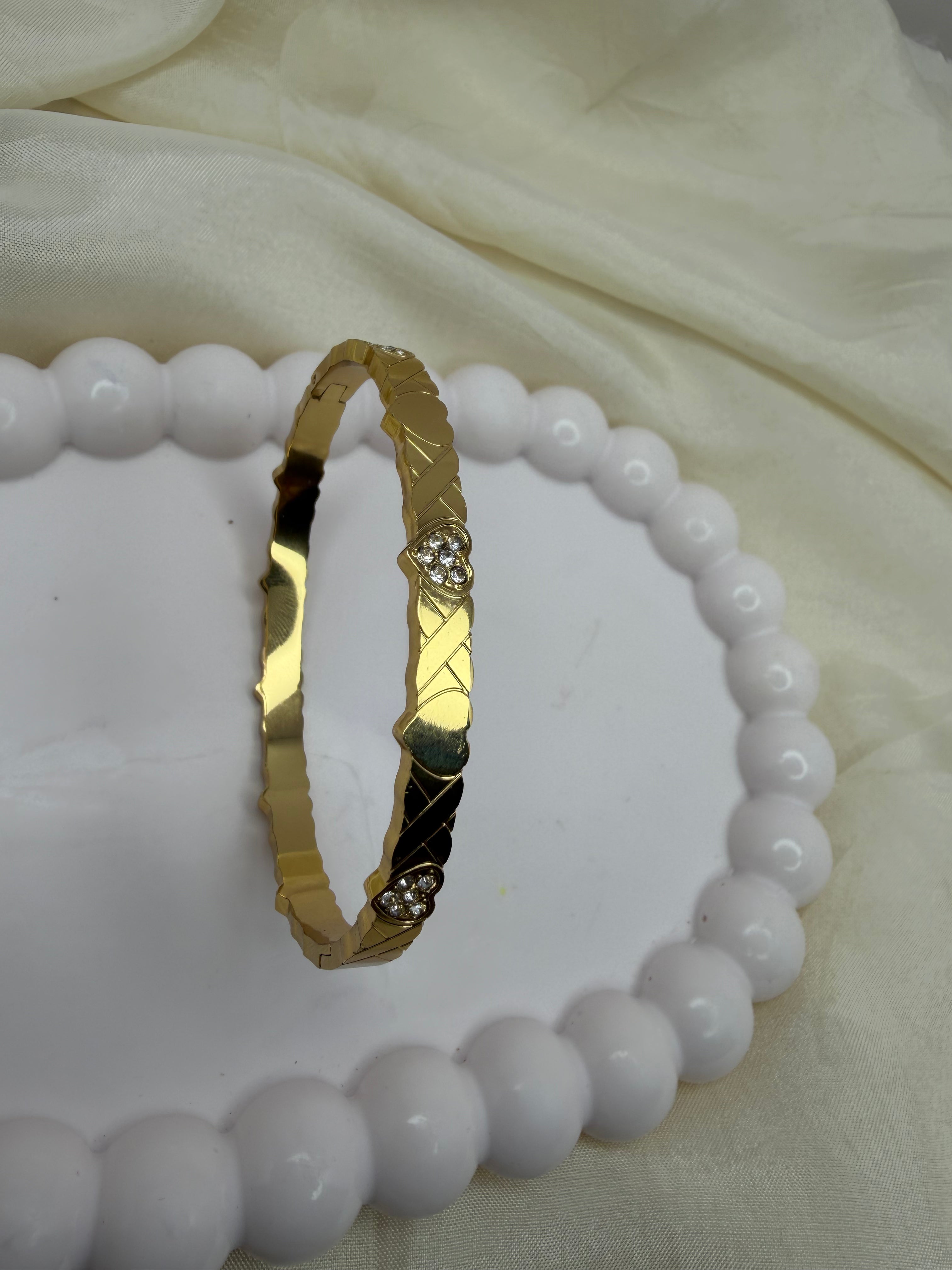 Rhythmic Heart Bangle Bracelet